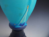 Sea blue glaze engraving tall foot vase